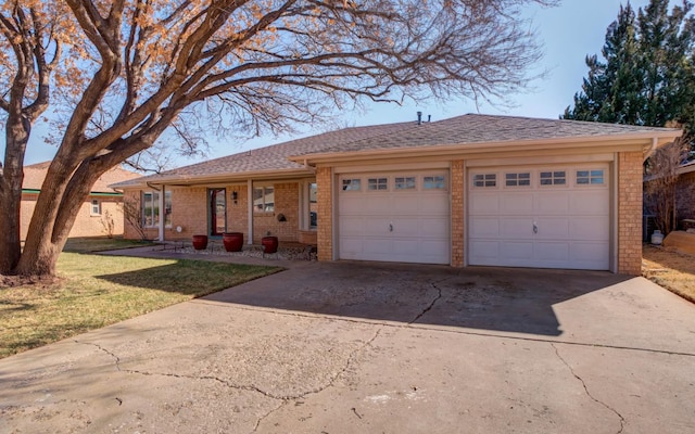 single story home with a garage