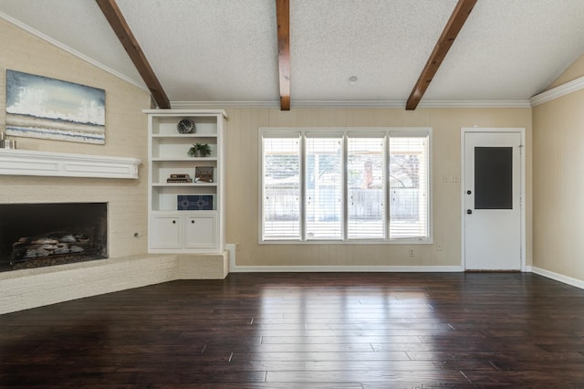 unfurnished living room with a fireplace, dark hardwood / wood-style flooring, lofted ceiling with beams, and a textured ceiling