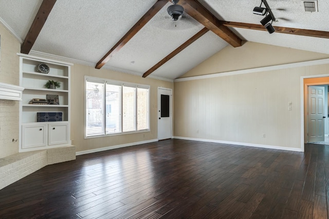 unfurnished living room with dark wood-type flooring, built in features, ceiling fan, vaulted ceiling with beams, and a textured ceiling