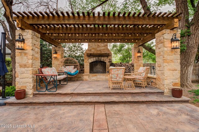 4510 21st St, Lubbock, TX 79407 - view of patio featuring an outdoor stone fireplace