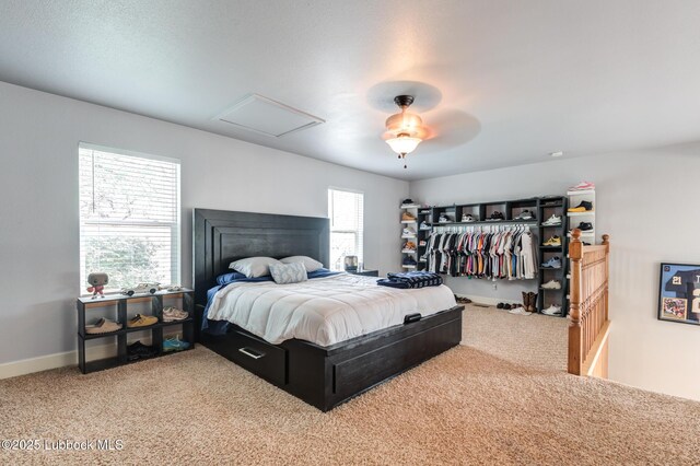 4510 21st St, Lubbock, TX 79407 - bedroom featuring carpet, attic access, and ceiling fan