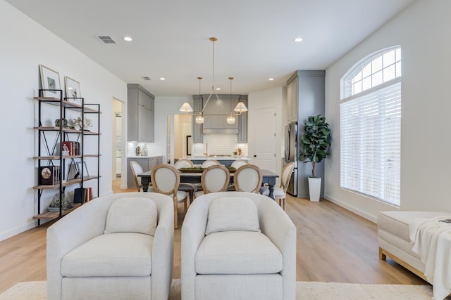 living room featuring light wood-type flooring