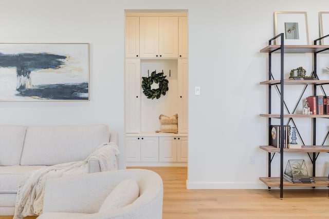 sitting room featuring light hardwood / wood-style floors