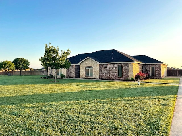 view of front of property with a front lawn