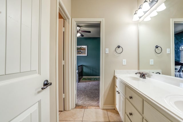 bathroom with tile patterned flooring and vanity