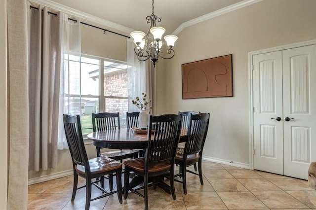 dining area featuring an inviting chandelier, light tile patterned floors, and ornamental molding