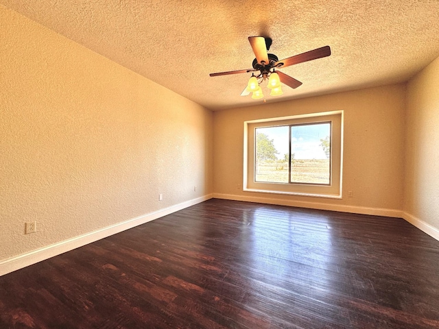 unfurnished room featuring ceiling fan, a textured ceiling, and dark hardwood / wood-style flooring