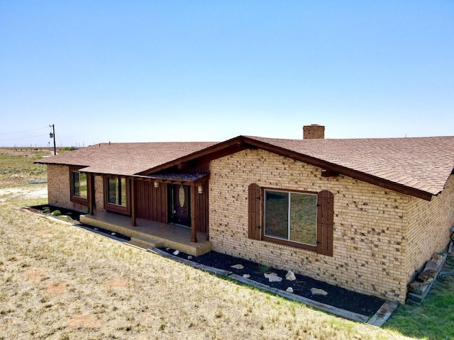 back of house featuring a patio area