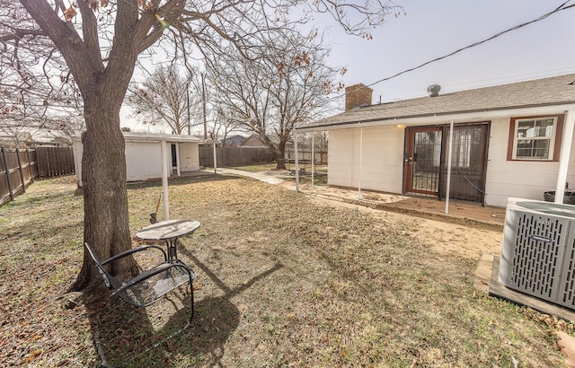 view of yard with central AC