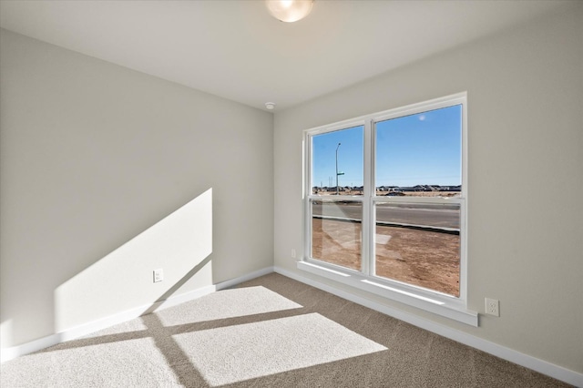 view of carpeted spare room