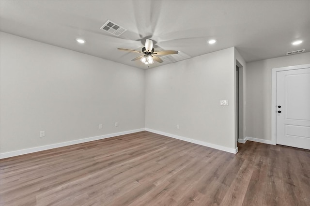 unfurnished room featuring ceiling fan and light hardwood / wood-style floors