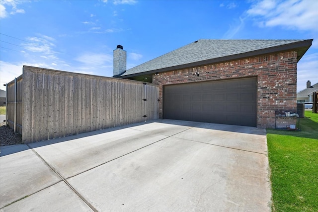 view of home's exterior with a garage