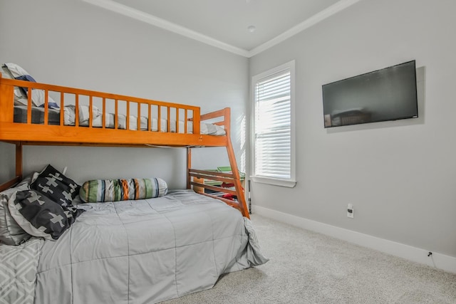 bedroom featuring crown molding and carpet floors