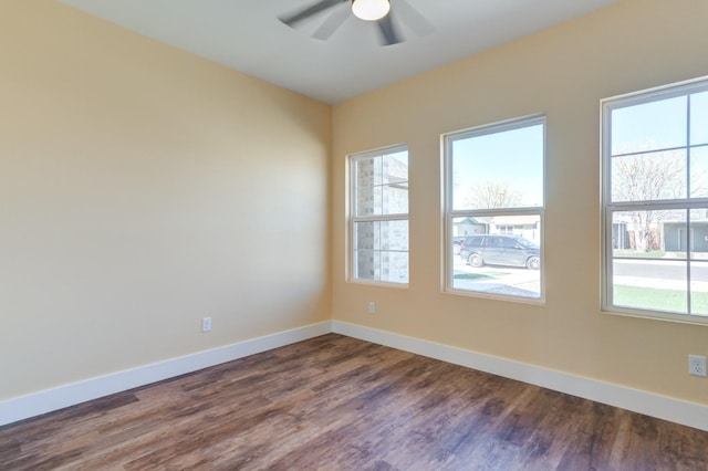 unfurnished room with hardwood / wood-style flooring, ceiling fan, and plenty of natural light