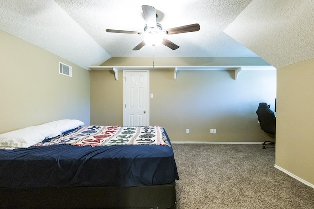 9613 Vicksburg Ave, Lubbock, TX 79424 - carpeted bedroom featuring a textured ceiling, ceiling fan, and lofted ceiling