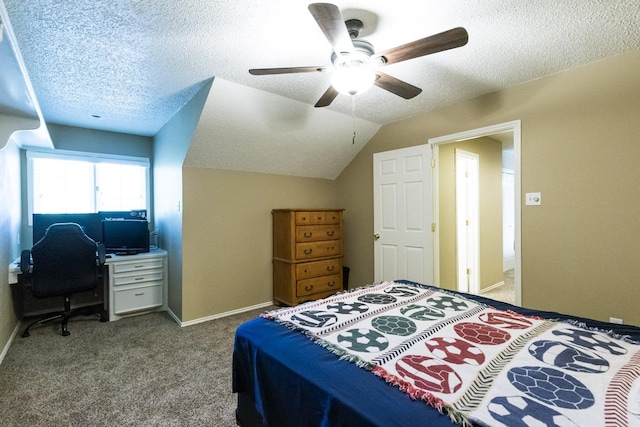 9613 Vicksburg Ave, Lubbock, TX 79424 - bedroom featuring a textured ceiling, carpet floors, ceiling fan, a desk, and lofted ceiling