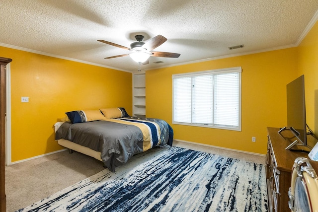 9613 Vicksburg Ave, Lubbock, TX 79424 - bedroom featuring ornamental molding, a textured ceiling, carpet floors, and ceiling fan
