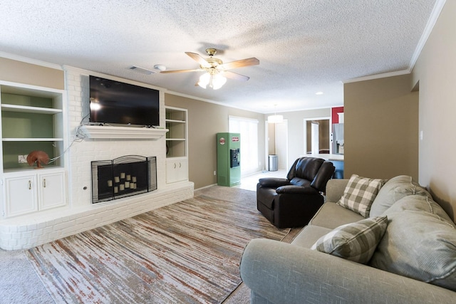 9613 Vicksburg Ave, Lubbock, TX 79424 - living room featuring crown molding, a textured ceiling, ceiling fan, carpet flooring, and built in shelves