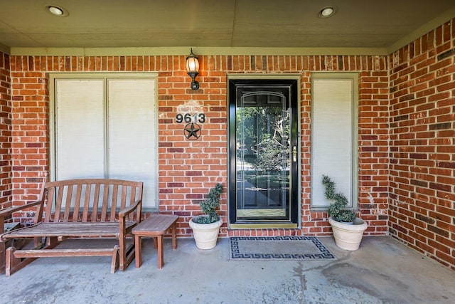 9613 Vicksburg Ave, Lubbock, TX 79424 - entrance to property with brick siding and a porch