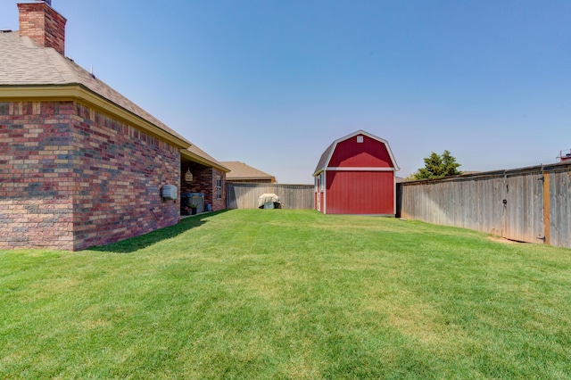 4902 Marshall St, Lubbock, TX 79416 - fenced backyard featuring an outbuilding and a barn