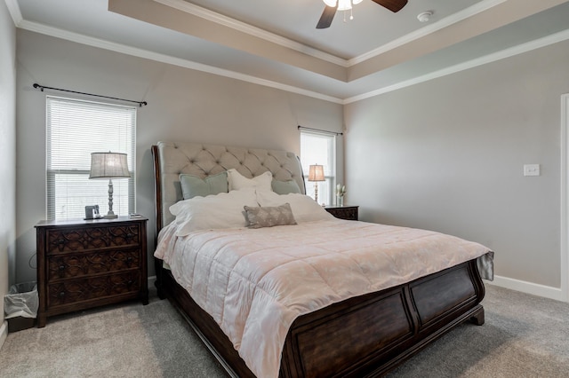 4902 Marshall St, Lubbock, TX 79416 - bedroom featuring carpet floors, a tray ceiling, ornamental molding, and a ceiling fan