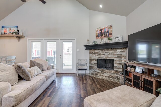 4902 Marshall St, Lubbock, TX 79416 - living room with high vaulted ceiling, a ceiling fan, wood finished floors, and a fireplace