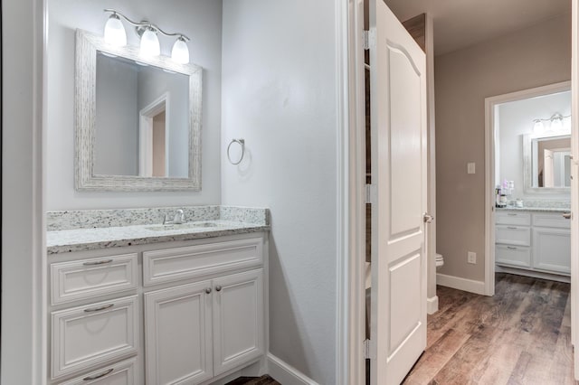 4902 Marshall St, Lubbock, TX 79416 - bathroom with vanity and wood finished floors