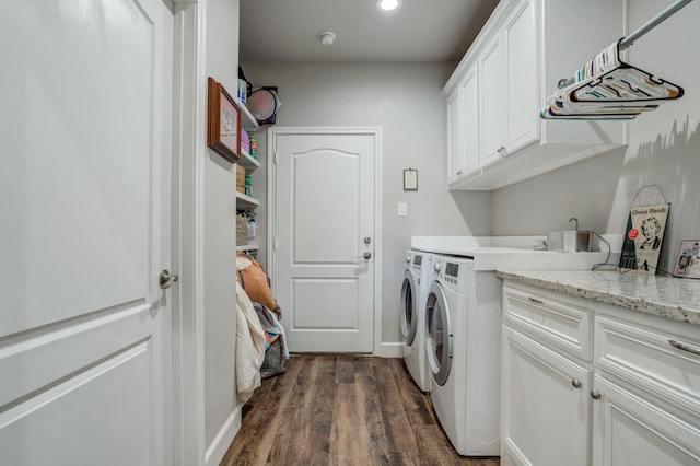4902 Marshall St, Lubbock, TX 79416 - washroom with cabinet space, washer and clothes dryer, dark wood-style flooring, and recessed lighting
