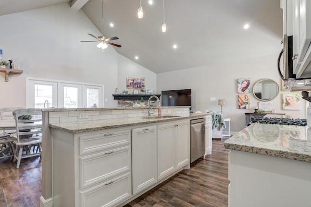 4902 Marshall St, Lubbock, TX 79416 - kitchen with appliances with stainless steel finishes, high vaulted ceiling, white cabinetry, dark wood-style floors, and a ceiling fan