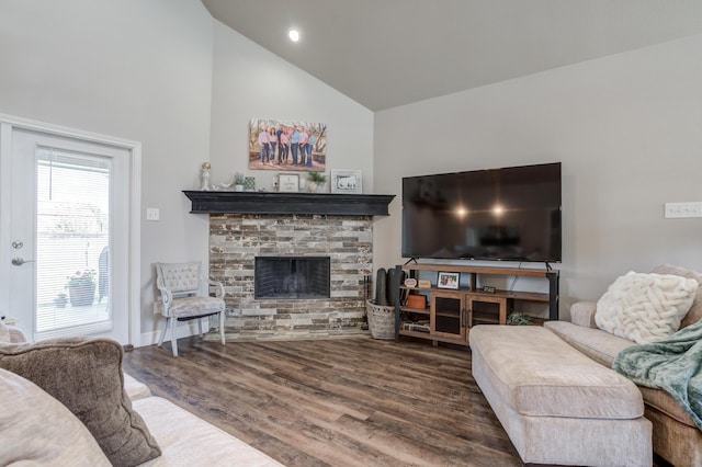 4902 Marshall St, Lubbock, TX 79416 - living area with high vaulted ceiling, wood finished floors, and a fireplace