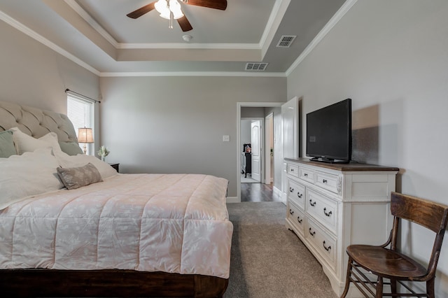 4902 Marshall St, Lubbock, TX 79416 - bedroom featuring a tray ceiling, crown molding, a ceiling fan, and carpet floors