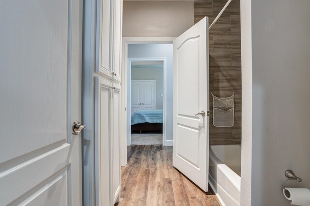 4902 Marshall St, Lubbock, TX 79416 - ensuite bathroom with wood finished floors and shower / tub combination