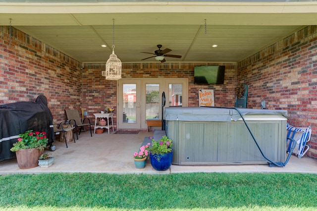 4902 Marshall St, Lubbock, TX 79416 - view of patio / terrace with an indoor hot tub, french doors, a ceiling fan, and a grill