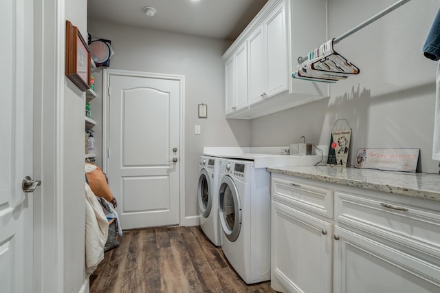 4902 Marshall St, Lubbock, TX 79416 - laundry room with cabinet space, washer and clothes dryer, and dark wood finished floors