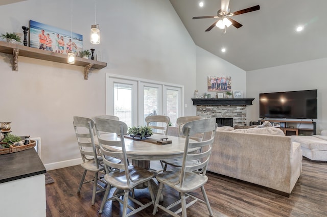 4902 Marshall St, Lubbock, TX 79416 - dining space with high vaulted ceiling, a fireplace, a ceiling fan, dark wood-style floors, and recessed lighting