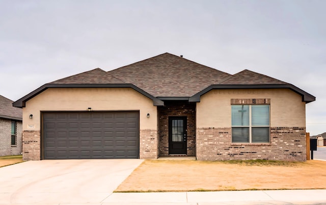 view of front of home with a garage