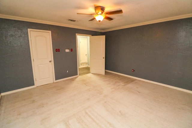 unfurnished bedroom with ceiling fan, ornamental molding, and light hardwood / wood-style flooring