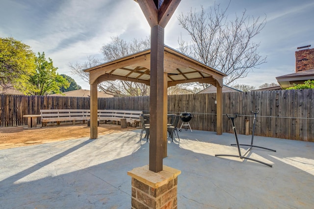 view of patio / terrace featuring a gazebo and a fenced backyard