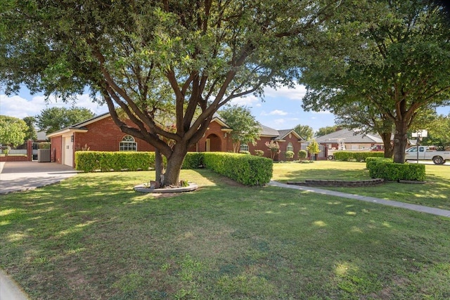 ranch-style home with a front yard