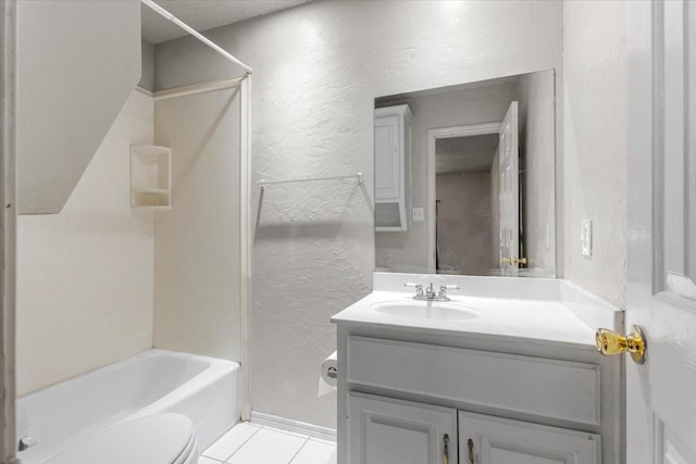 full bathroom featuring vanity, toilet, tub / shower combination, and tile patterned flooring