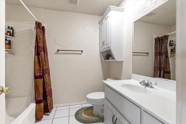 full bathroom with toilet, shower / tub combo, a textured ceiling, vanity, and tile patterned flooring