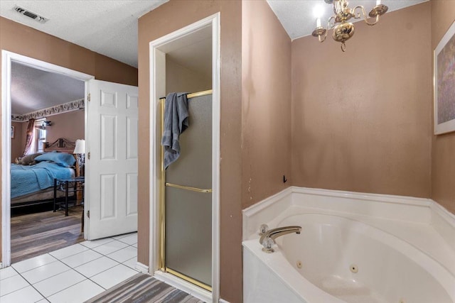 bathroom with shower with separate bathtub, a chandelier, tile patterned floors, and a textured ceiling