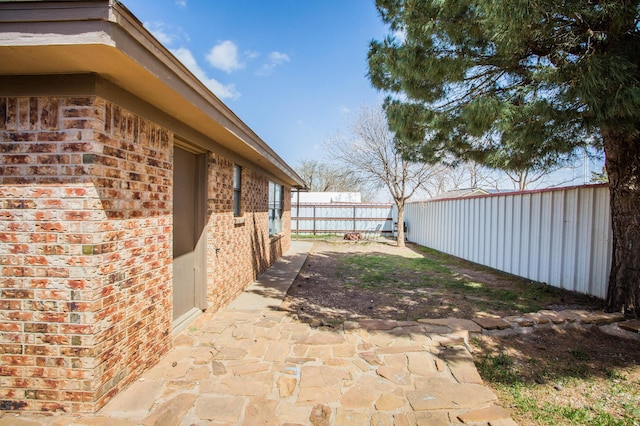 exterior space featuring a fenced backyard