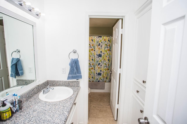 full bath featuring tile patterned floors, a shower with shower curtain, and vanity