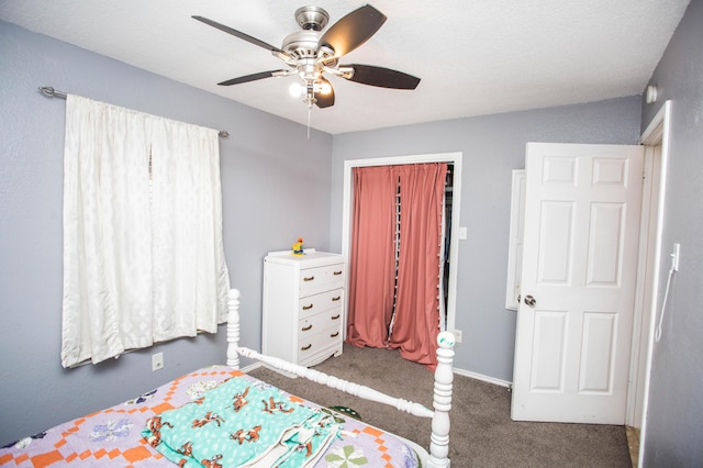bedroom with carpet, a closet, and ceiling fan
