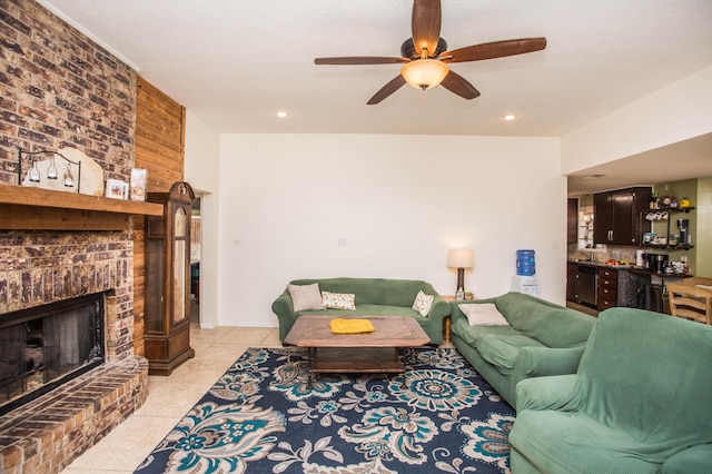 living area with recessed lighting, a fireplace, light tile patterned floors, and ceiling fan