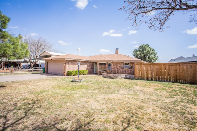 ranch-style house with an attached garage, a chimney, fence, and a front lawn