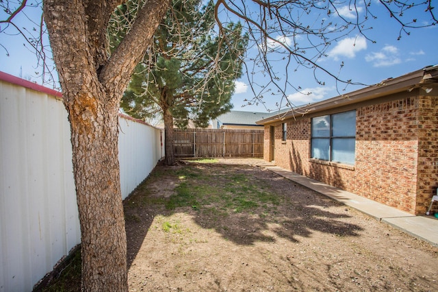 view of yard featuring a fenced backyard