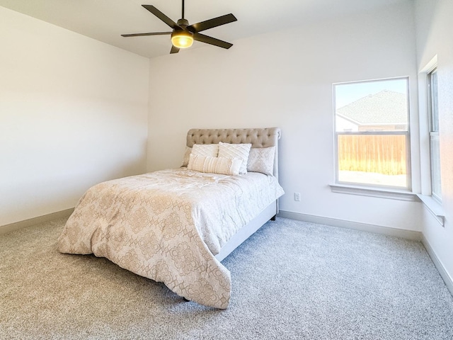 bedroom featuring ceiling fan and carpet flooring