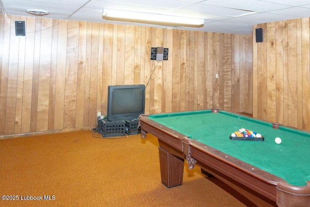 303 Comanche Trl, Tulia, TX 79088 - game room with wood walls, carpet floors, a paneled ceiling, and billiards table